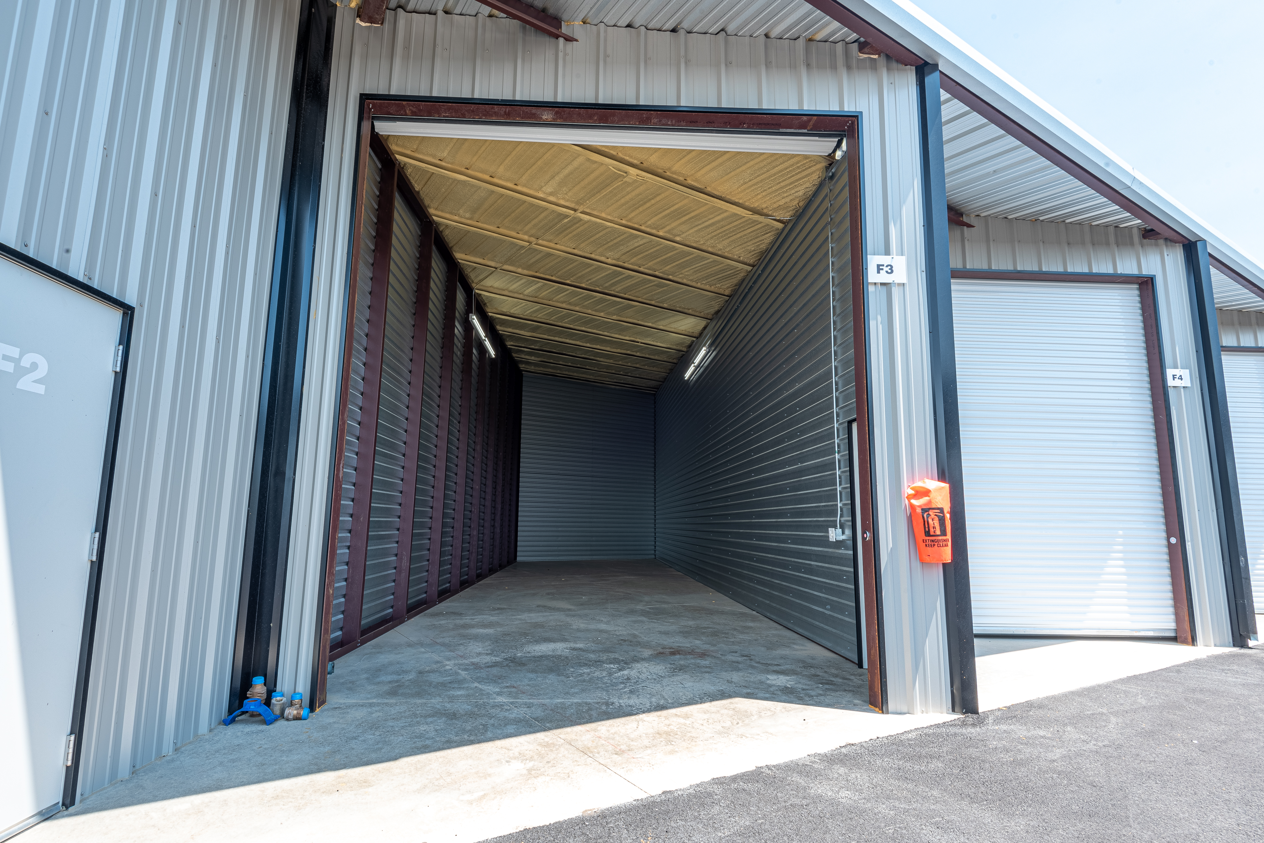 Haley Boat & RV Storage offers Enclosed parking units with extra high ceilings and automated doors